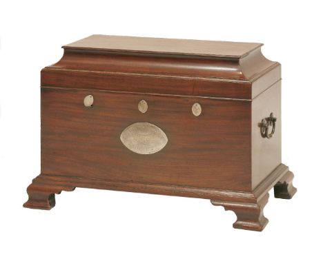 A George III mahogany document box,the cushion-moulded lid enclosing a lift-out compartment with two drawers, the front with 