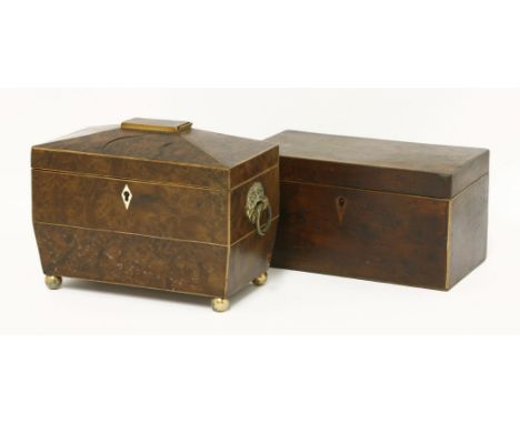 A George III burr yew wood tea caddy,of sarcophagus shape, with brass ring handles,19cm long, anda George III yew wood tea ca
