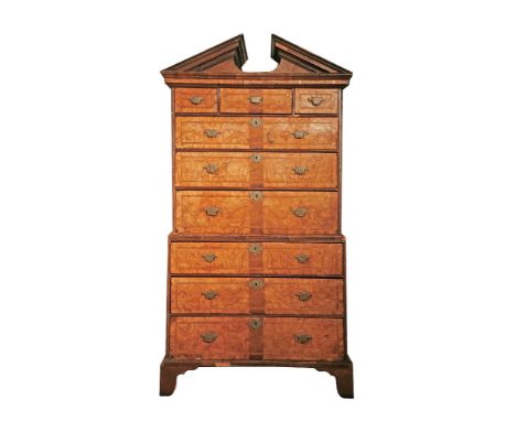 A rare George II ash, walnut and oak chest on chest,c.1740, probably an estate piece, with a bold broken pediment over three 