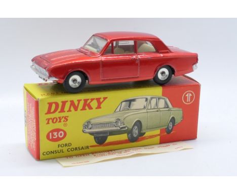 Dinky Toys - A boxed Dinky Toys #130 Ford Consul Corsair . The model in metallic red with off-white interior,  with spun hubs