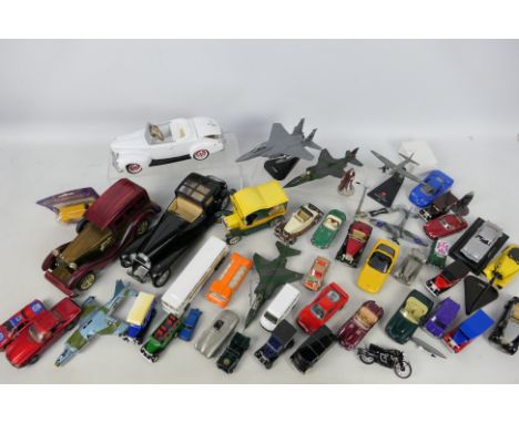 Dinky Toys - Corgi - Schuco - Maisto - Others - An unboxed group of diecast, plastic, and wood model vehicles in a variety of