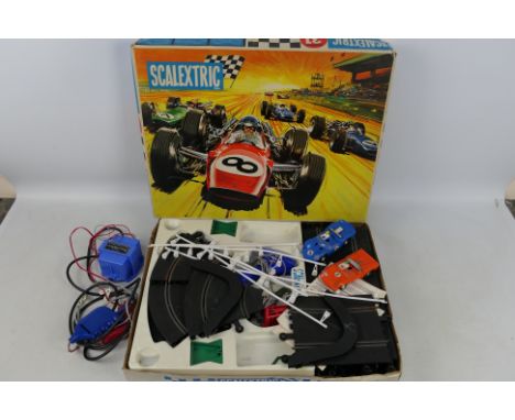 Scalextric - A boxed vintage Scalextric  'Sports 31 Set'. The 1968/69 set contains a Javelin &amp; Electra Competition Cars, 