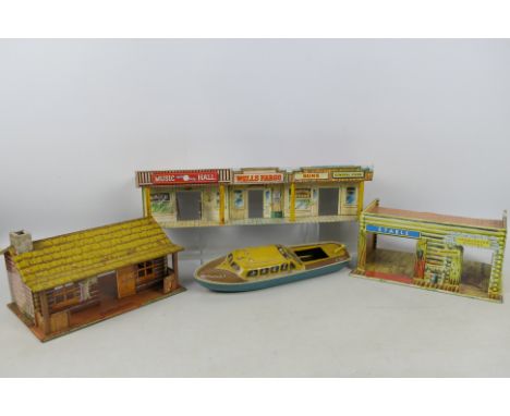 Marx - Mettoy - 4 x models, two Marx USA made Wild West tinplate buildings and a similar British Mettoy Wild West  building a