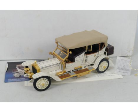 Franklin Mint - A 1:24 die-cast 1911 Rolls Royce Tourer. Model is presented in inner polystyrene box and outer postage box. M