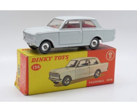 Dinky Toys - A boxed Dinky Toys #136 Vauxhall Viva. The model in white/grey body with red interior, white steering wheel with