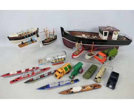 Dinky Toys - Matchbox - A mixed lot consisting of unboxed diecast model vehicles and ships, with a group of wooden ornamental