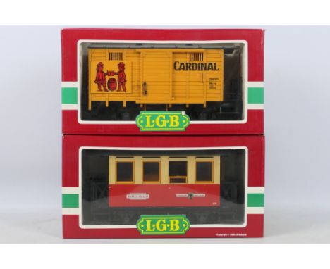 Lehmann Gross Bahn - LGB - 2 x boxed G gauge rolling stock, a Buffet Car # 3016 and a Cardinal Box Car # 4034. They appear in
