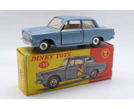 Dinky Toys - A boxed Dinky Toys #139 Ford Consul Cortina. The model in metallic blue body with fawn interior, black steering 