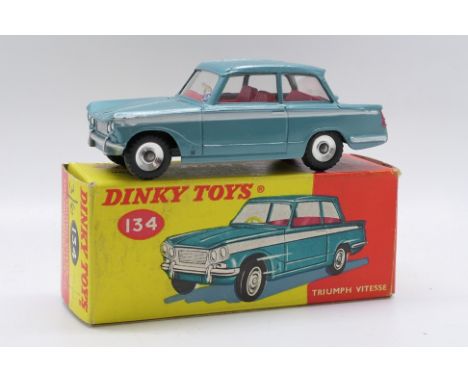 Dinky Toys - A boxed Dinky Toys #134 Triumph Vitesse. The model in metallic aqua blue body with white stripe, red interior, w