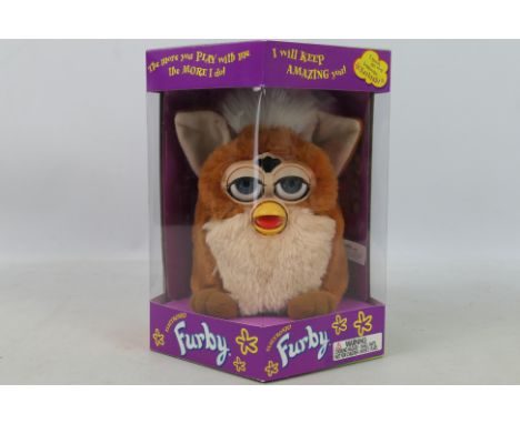Hasbro - Tiger Electronics - A boxed model #70-800 1999 Generation 4 'Coffee' Electronic Furby by Hasbro. The Furby with brow