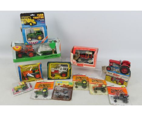 Corgi - Yaxon - Playart - Others - A boxed and carded collection of diecast model tractors in various scales. Lot includes Ya