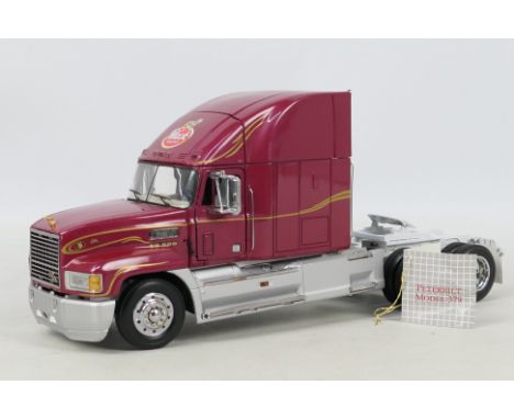 Franklin Mint - A 1:32 die-cast 1993 Mack Truck in dark red livery. Model is presented in inner polystyrene box and outer pos