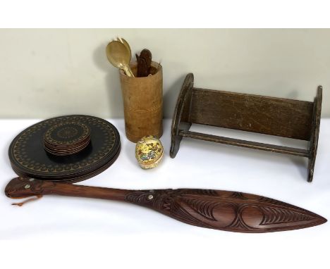 A group of decorative objects, to include: a book trough, African carvings, bone spoons, tankards, (A Lot).&nbsp;