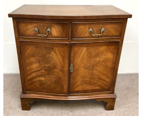 A Reprodux Georgian style side cabinet with two short drawers over cupboard with shelf, 76 x 75 x 49 cm.