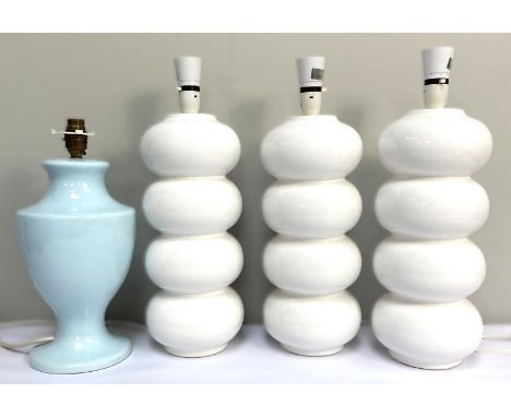 Set of three china bobbin style table lamps, 45cm to top of map holder, and another, (4)