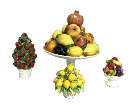 A Spanish decorative ceramic fruit stand topped by a pomegranate marked Casasus, 38cm, with three others, (4).