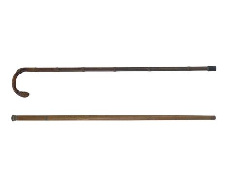A sectional tippling cane. The middle section a long glass stopper tube, the handle with small stem glass, together with a ba