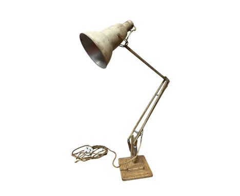 A model 1227 Herbert Terry Anglepoise lamp. On a stepped square base.