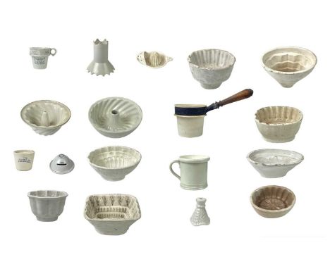 A collection of eight various pottery jelly moulds. 19th Century and later together with various ceramic kitchenalia.
