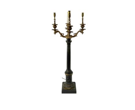 A 19th century bronze and gilt metal five branch candelabra. Raised on a central tapering cylindrical column, the lower drum 