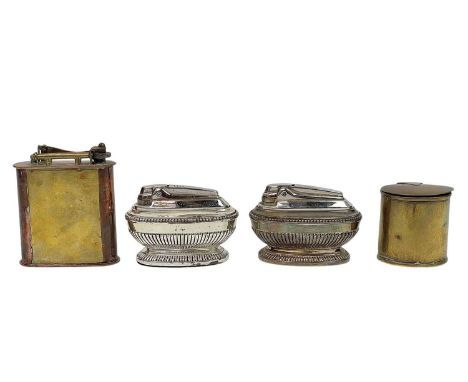 An early 20th century brass and copper cigarette lighter. Height 9cm together with a copper and brass table vesta box and two