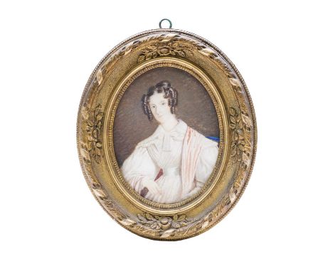 A 19th century oval portrait of a lady. Watercolour on paper, in a gilt gesso frame, 16cm x 12.5cm frame size 25cm x 21cm.