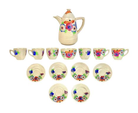 A Clarice Cliff Anemone pattern Lynton shape part coffee set. Comprising a coffee pot and cover, height 18.5cm, six cups and 