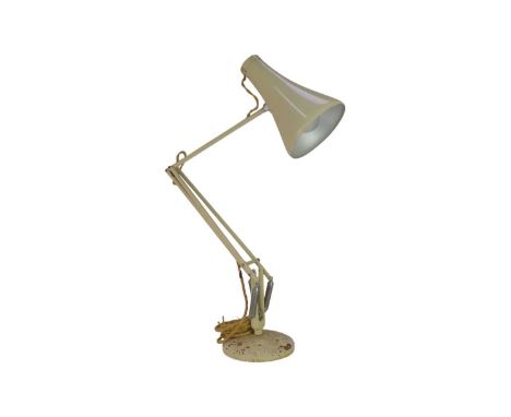 A model 75 Herbert Terry Anglepoise lamp. On a circular base.