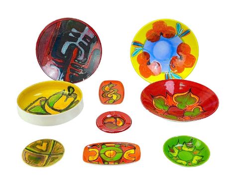 A collection of Poole pottery. Comprising a vibrant orange bowl, diameter 26.5cm, two other bowls, a Delphis dish, and five s