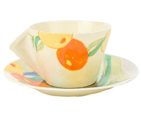 A Clarice Cliff Citrus pattern conical cup. Wilkinson Ltd mark, together with a Clarice Cliff Delecia Citrus pattern saucer B
