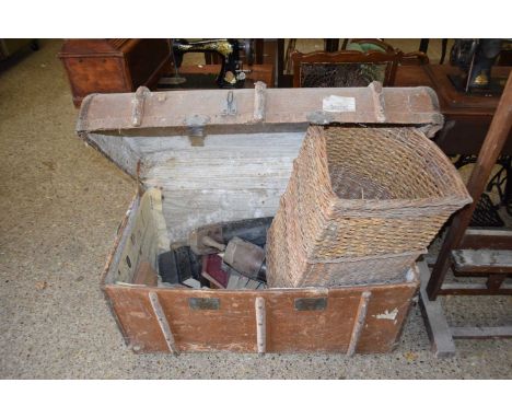 Vintage wooden bound trunk containing assorted items including books, leather boots, corner basket etc