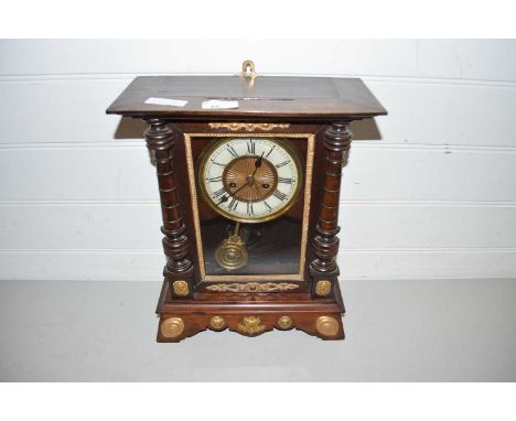 Late 19th/early 20th Century mantel clock in architectural wooden case with applied metal mounts