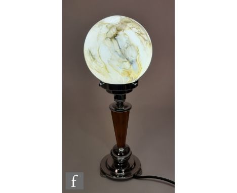 Unknown - A 1930s Art Deco table lamp, the chromed stepped circular base extending to an amber coloured phenolic stem and ter