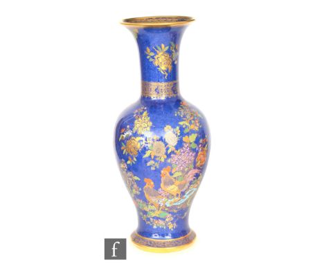 Wiltshaw and Robinson - Carlton Ware - A large 1920s Cock and Peony pattern baluster vase with a flared neck decorated with g