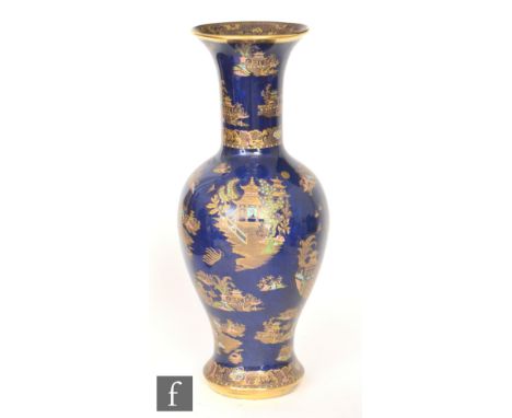 Wiltshaw and Robinson - Carlton Ware - A large 1920s vase of baluster form with a large flared neck decorated with gilt and e