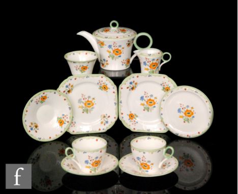 Shelley - A 1930s Regent shape tea for two decorated in the Posie Spray 12576 pattern, comprising a teapot, two cups and sauc