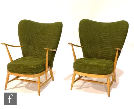 Lucian Ercolani for Ercol Furniture - A pair of beech model 203 Windsor Bergere easy chairs, with original moss green cloth u