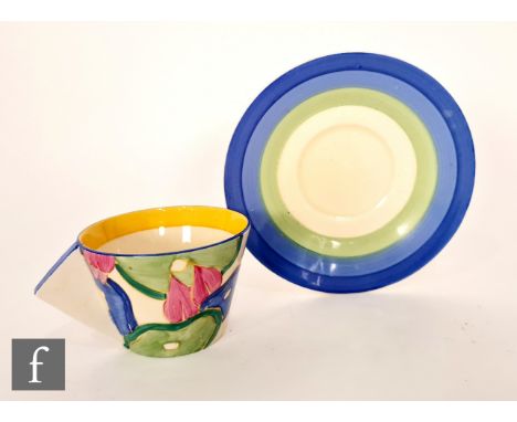 Clarice Cliff - Blue Chintz - A conical cup and saucer circa 1933, hand painted with stylised flowers and foliage with tonal 