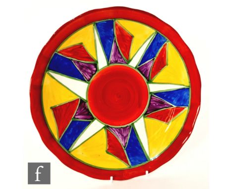 Clarice Cliff - Original Bizarre - A large circular wave edge plated circa 1927, radially hand painted with a cartwheel desig