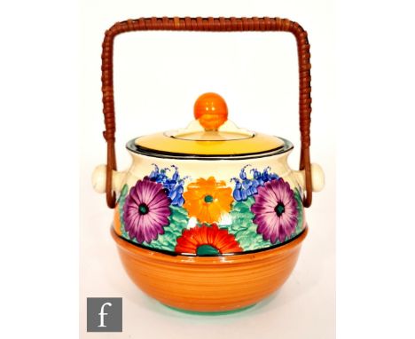 Clarice Cliff - Gay Day - A shape 335 biscuit barrel with original handle circa 1930, hand painted with a band of stylised fl