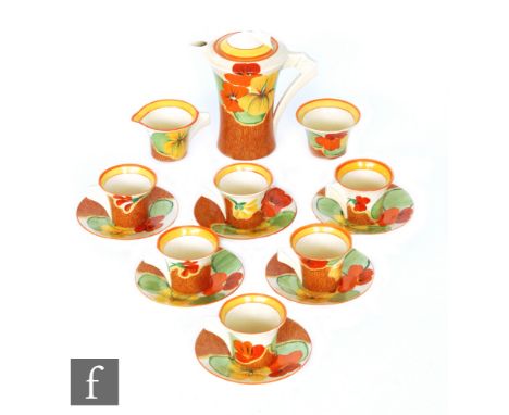 Clarice Cliff - Nasturtium - A Daffodil coffee set comprising coffee pot, cream, sugar and six cups and saucers, all decorate