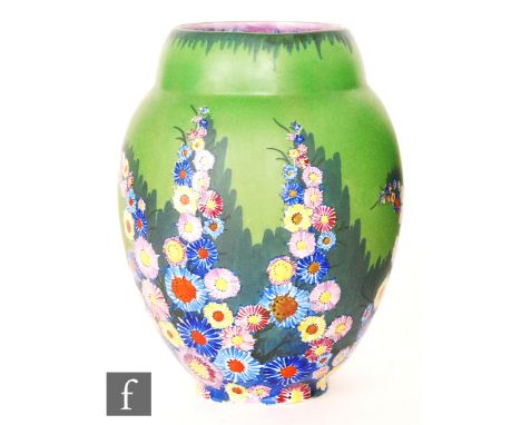 Carlton Ware - A 1930s Art Deco Garden pattern vase of shouldered form decorated with enamel flower heads against a green gro