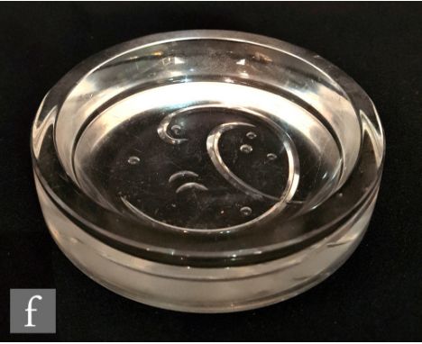 Vicke Lindstrand - Orrefors - A shallow glass dish of thick walled circular form engraved to the base with an abstract design
