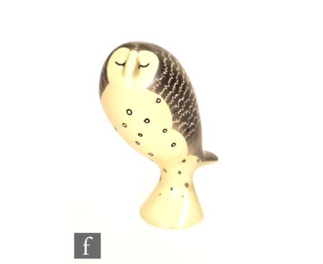 Colin Melbourne - Beswick - A 1950s owl, model 1420, the whole glazed in a yellow green with painted features, printed mark, 