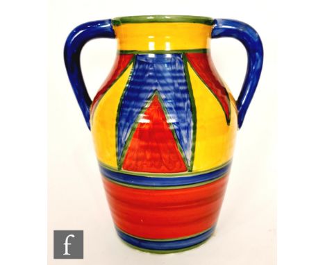 Clarice Cliff - Original Bizarre - A double handled Lotus jug circa 1928, hand painted with repeat panels of triangles in rus
