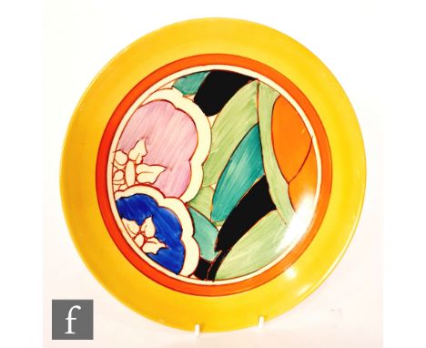 Clarice Cliff - Orange Gardenia - A large circular plate circa 1930, hand painted with stylised flowers and foliage with yell