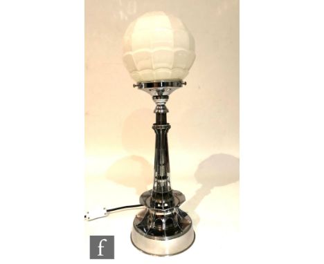 Unknown - An Art Deco chrome table lamp modelled as a stylised lighthouse below a white moulded glass globe shade, height 56c