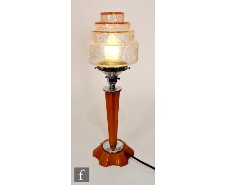 Unknown - A 1930s Art Deco table lamp, the amber coloured scalloped stem, raising to a tapered stem with chrome mounts and cr