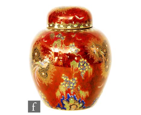 Carlton Ware - A large 1930s Art Deco Paradise Bird pattern ginger jar and cover decorated with gilt and enamel chinoiserie l