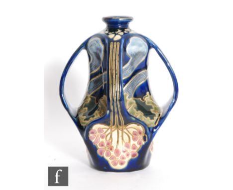 Sandor Apati Abt - Zsolnay - An early 20th Century Jugendstil / Art Nouveau vase with four pulled handles, the shaped body wi